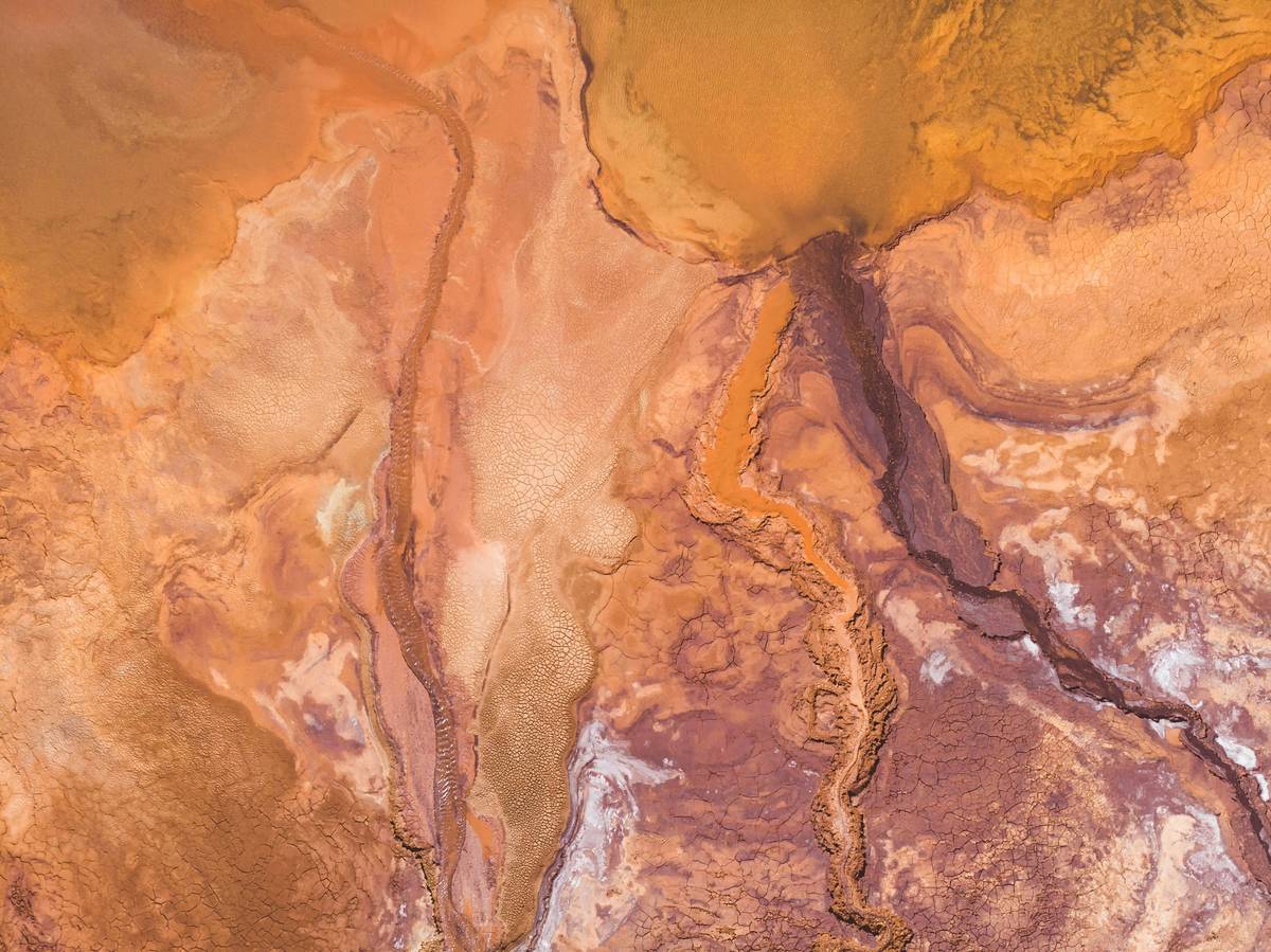 An aerial view of the vibrant and colorful waters surrounding the RioTinto mines in Huelva