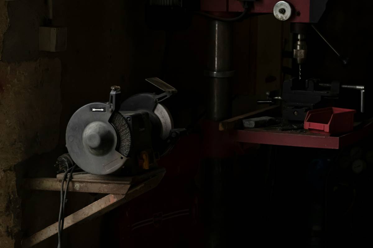Close-up of woodworking equipment band saw wood machine cutting curved hardwood with zero tear-out
